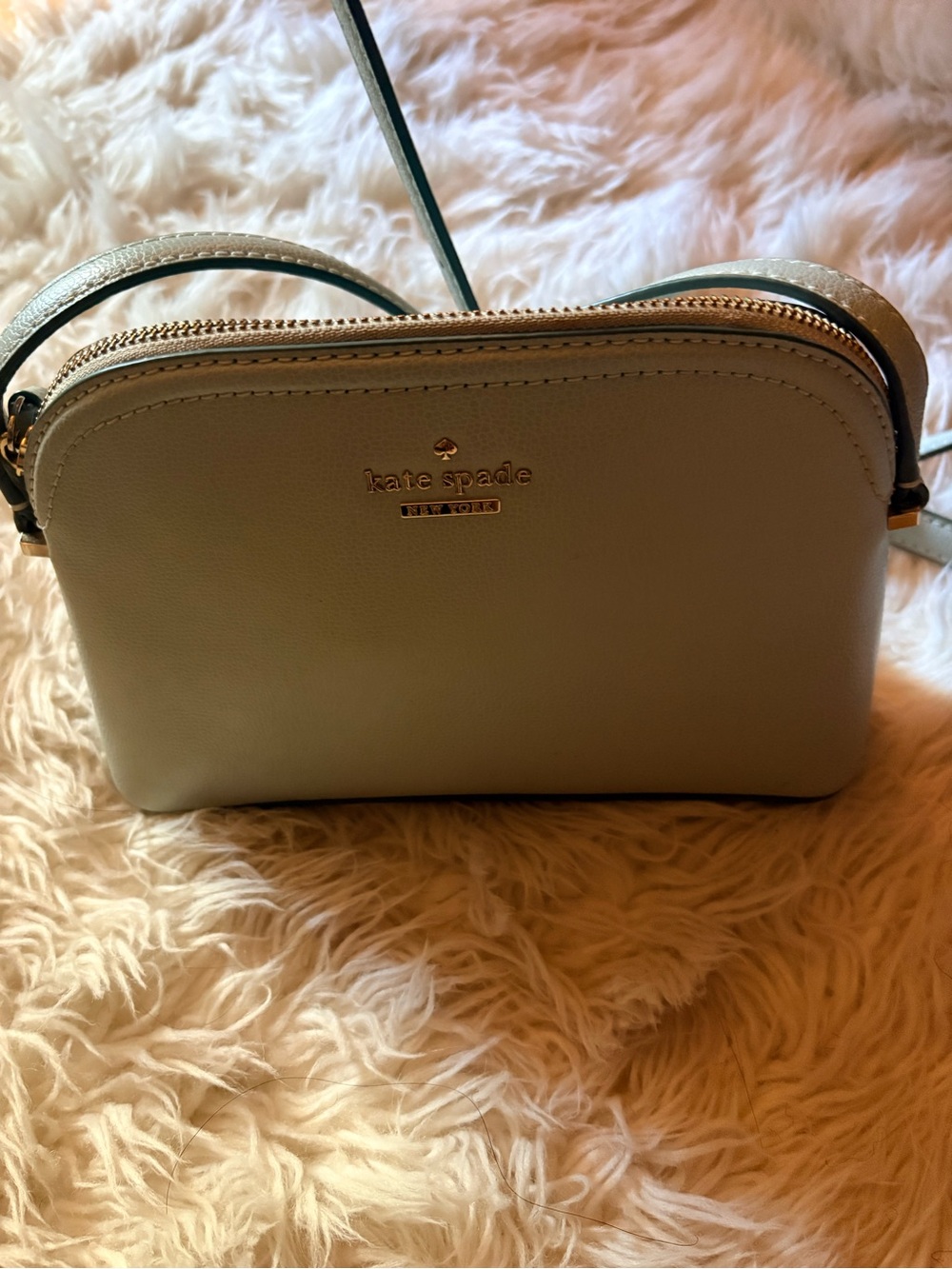 kate spade crossbody bag in pale blue with gold hardware